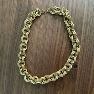 Gorgeous and heavy gold tone necklace. 16 inches long